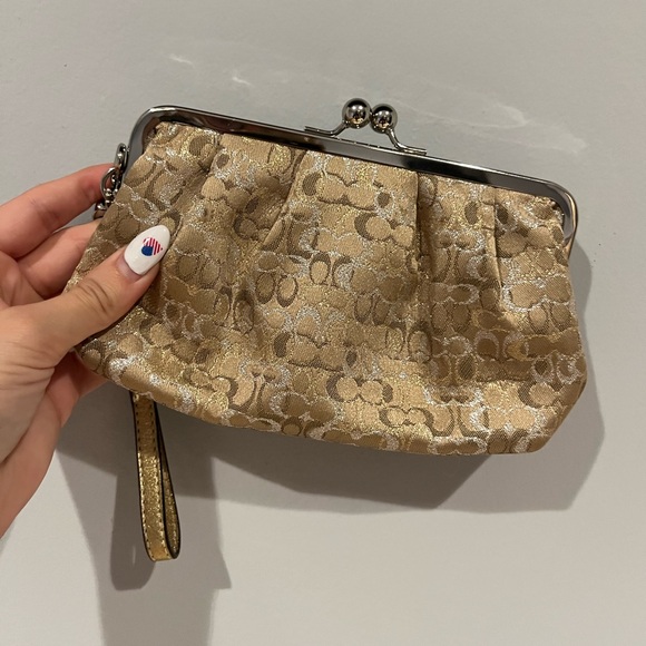 NWOT COACH tan with gold and silver C’s kiss lick wristlet